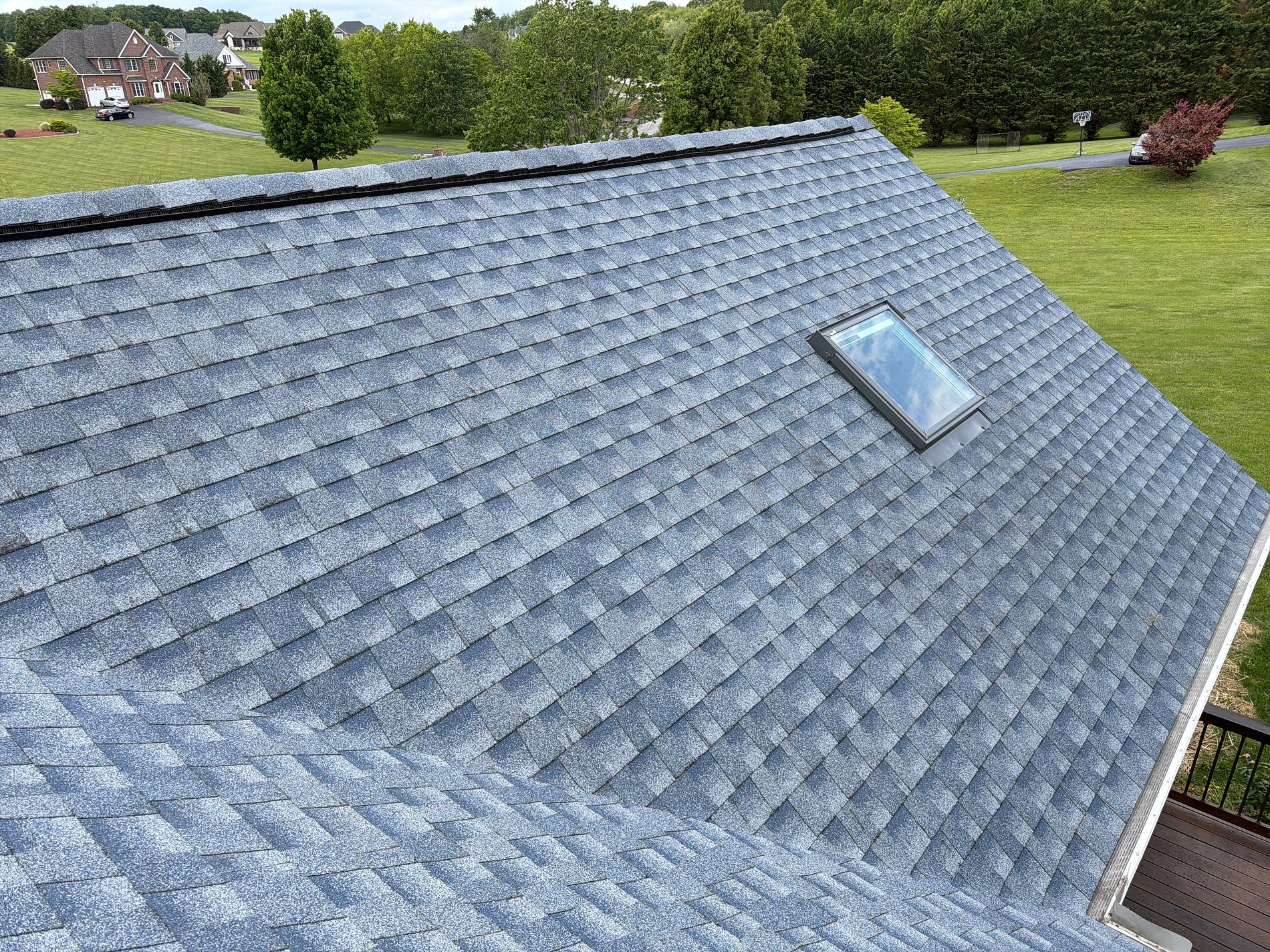 VELUX skylight installed on a shingle roof by Modern Day Roofing in the New River Valley